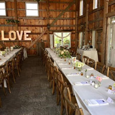 barn wedding venue, rustic wedding table,  love sign, wedding centre piece