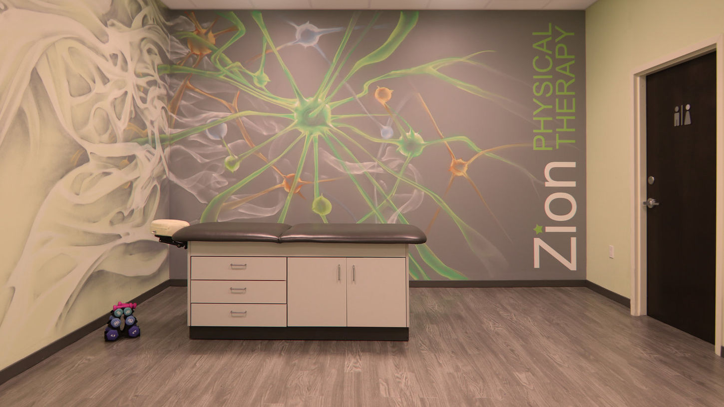 Private room that says Zion Physical Therapy on the wall