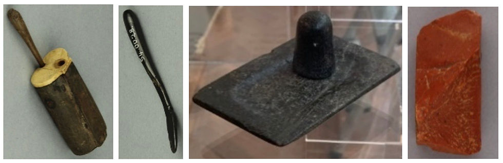 Double kohl tube with applicator, haematite spoon with hand, palette for grinding pigments & red mineral from Amarna (all Bolton Museum)