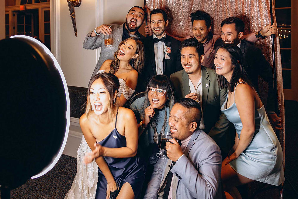 Family having fun at wedding with Instabooth Rental