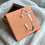 Thumbnail: Silver metal stylised cross cuff style bangle with engraving for religious celebration presented on a card gift box