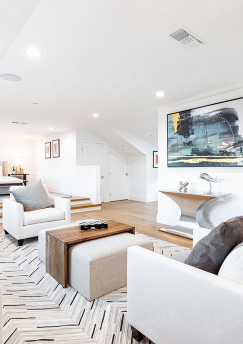 Rancher | Monument Home Builders

Living room #1

Modern, spacious living area with white furniture and large windows.