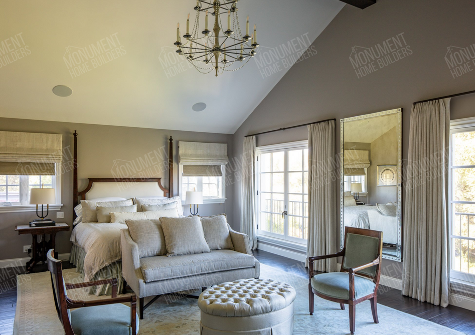 California Traditional | Monument Home Builders
Sunroom or sitting lounge with large windows
A cozy interior with seating, natural light, and a view of the outside.