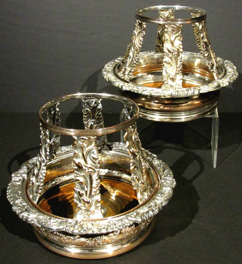 Thumbnail: An Extremely Rare Pair of ‘Old Sheffield Plate’ Wine Slide / Bottle Adapters