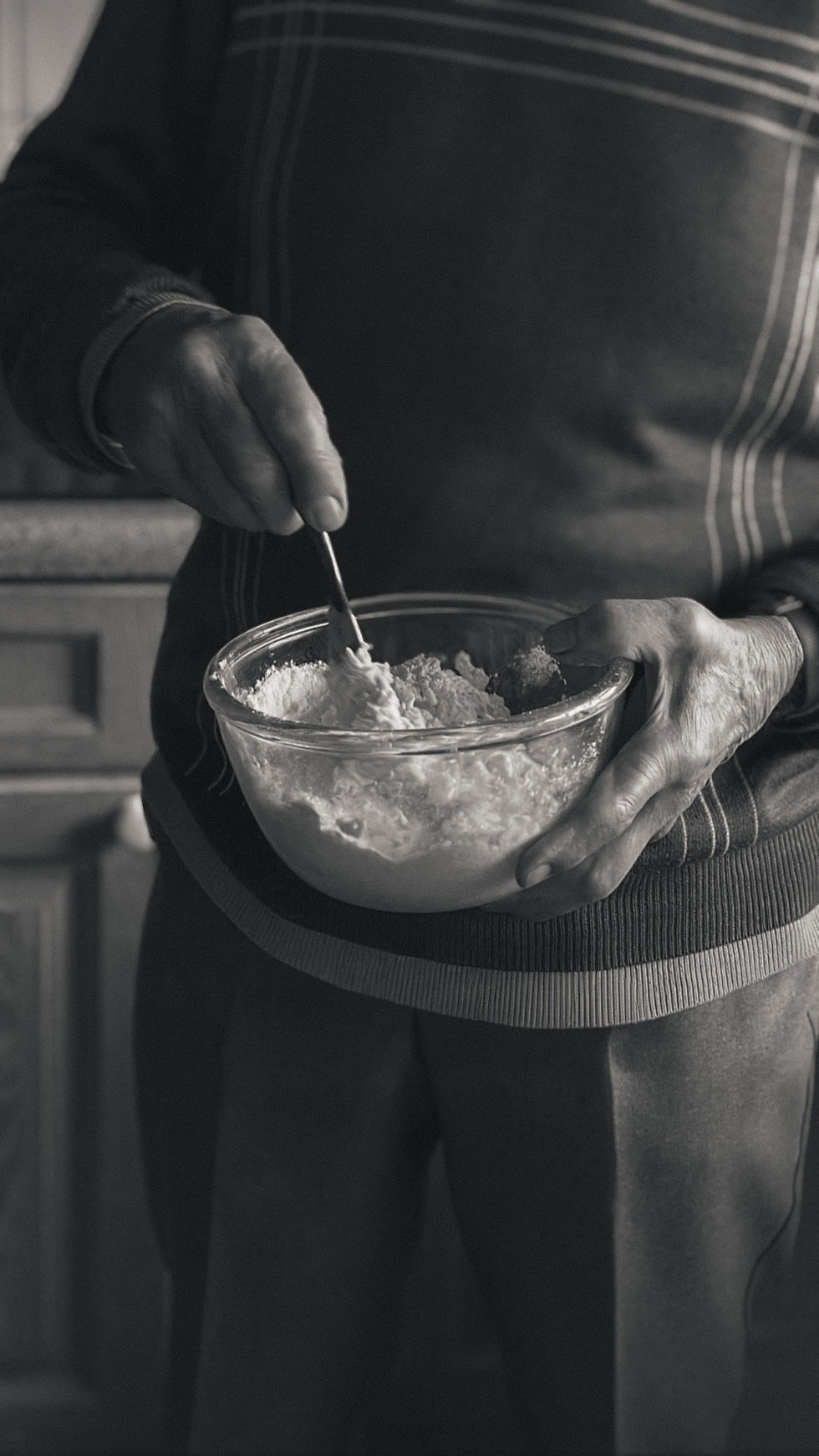 By Hand - Hands mixing flour in glass bowl_ vintage kitchen baking - TVS.jpg