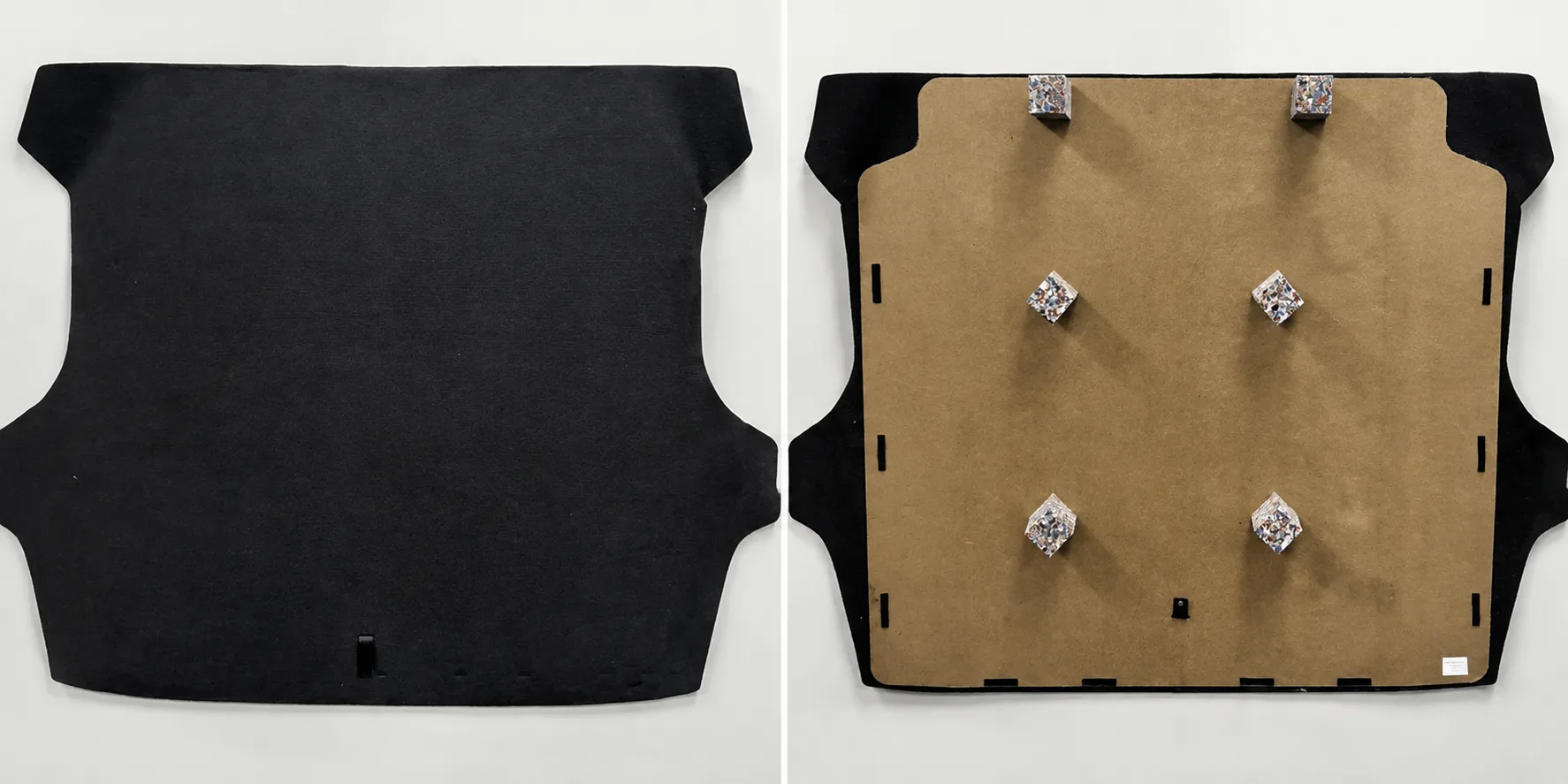 Front and reverse views of an automotive hardboard component