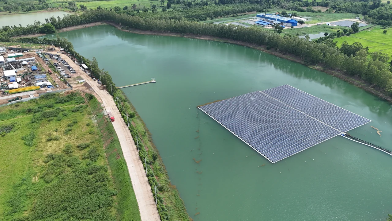 Floating solar panels on a reservoir beside the factory