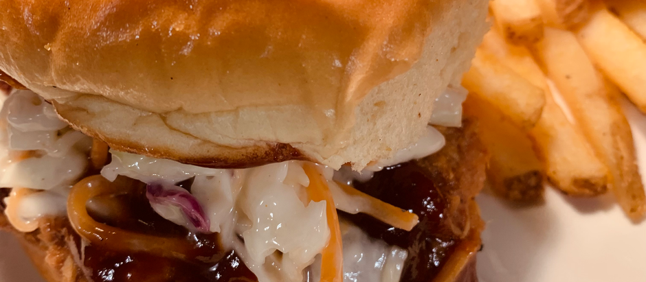 BBQ shredded chicken sandwich with homemade slaw.
