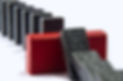 Red wooden wall preventing domino effect