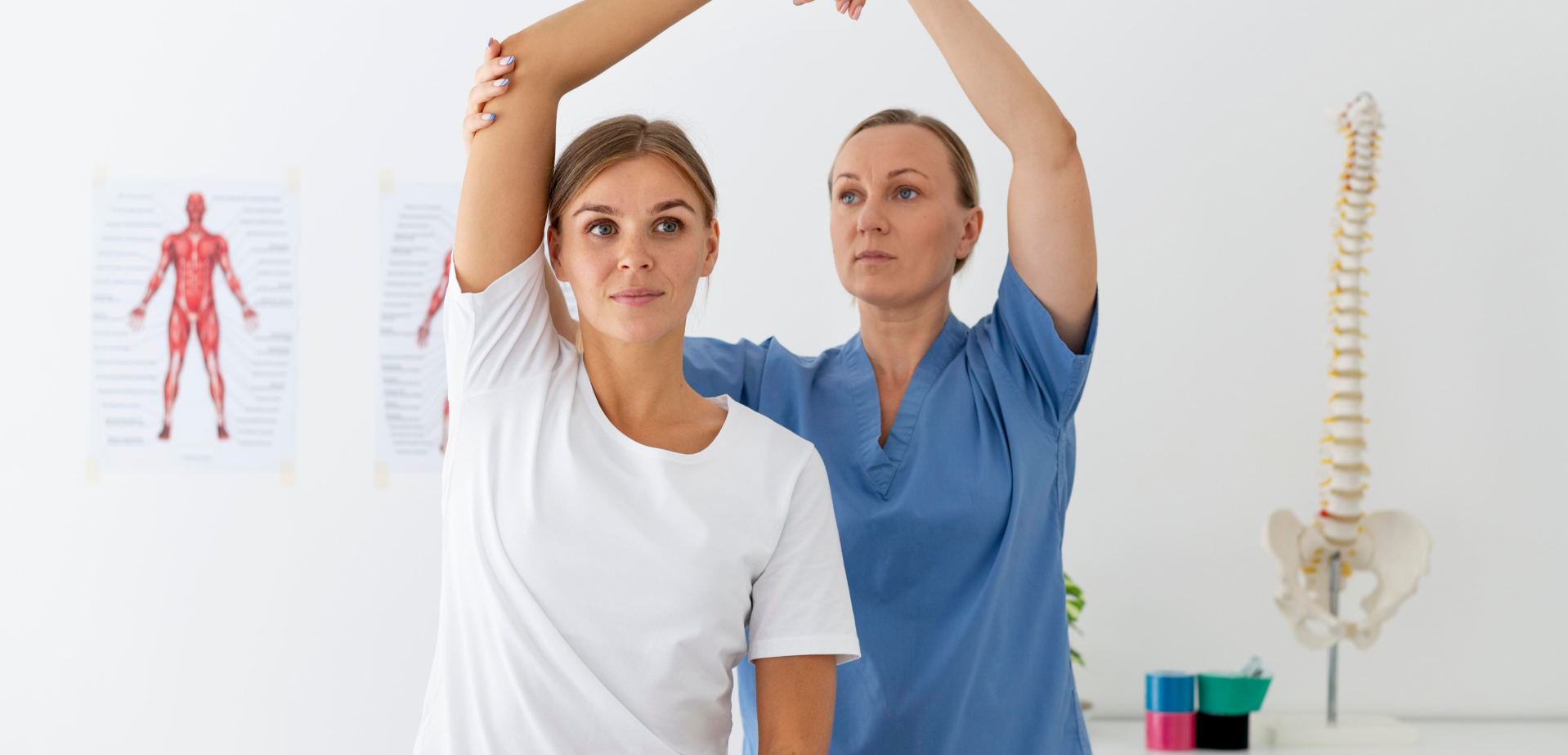 physiotherapist-helping-female-patient-at-her-clinic