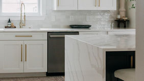 Full kitchen layout showing island, cabinetry and hardwood floors:
Open plan kitchen renovation with two-tone cabinetry — Beverly Hills Michigan by Costello & Co Construction Oakland County