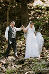father of bride walks her down the aisle on her elopement day
