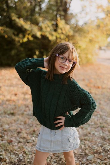 family photo. girl with hand on her hip being sassy