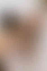 bride and groom with their dog on wedding day