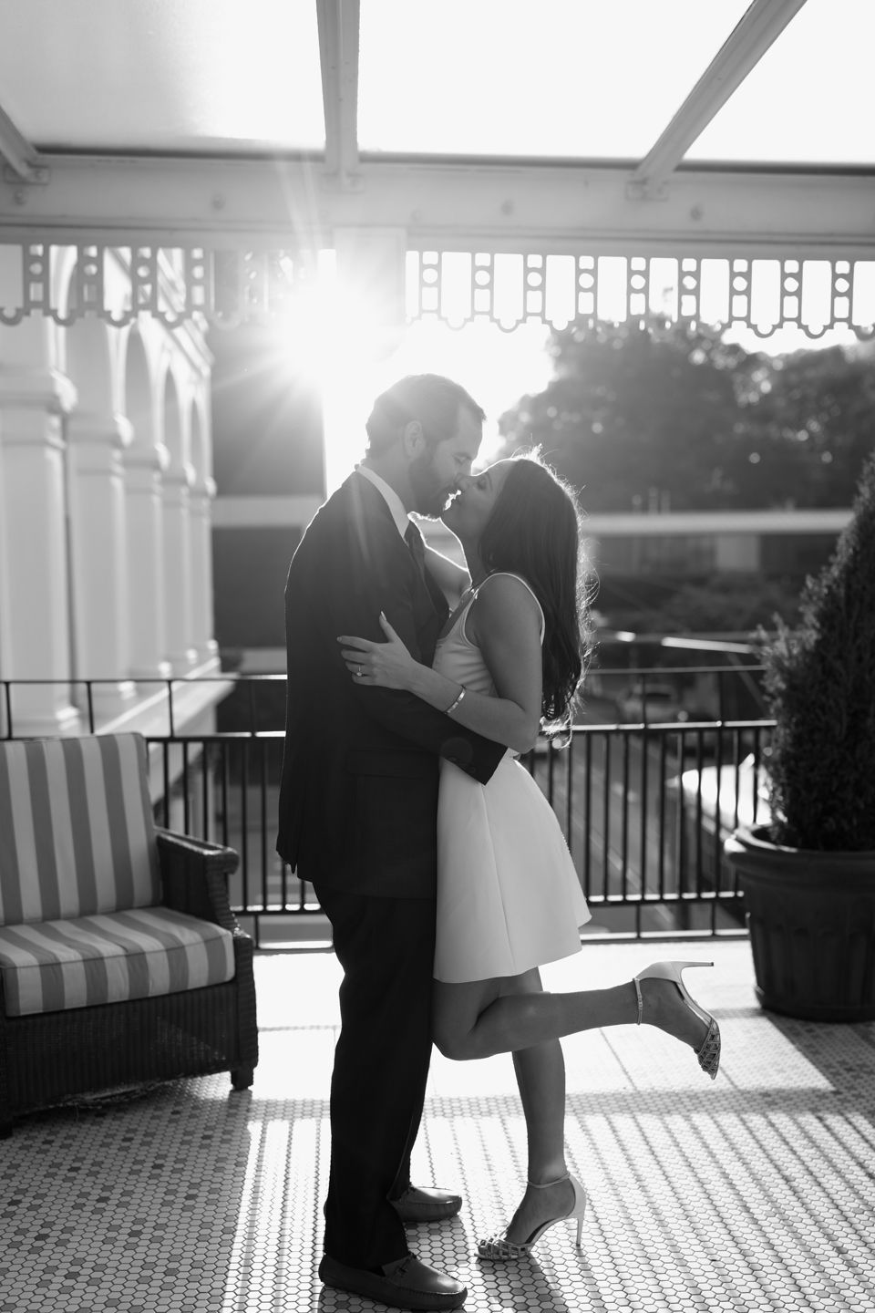 capital hotel engaged couple on balcony