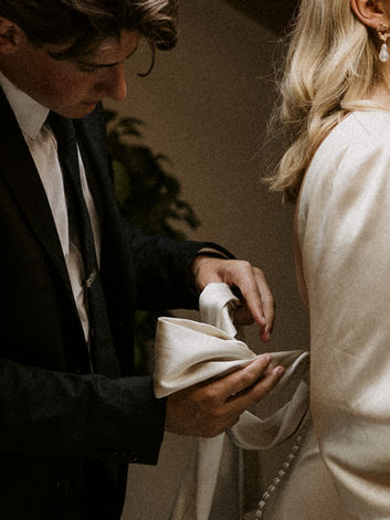couple get ready together on their elopement day in Switzerland