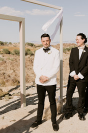 groom waiting for his bride at the alter