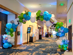 Large organic balloon arch for corporate gala at JW Hotel in Austin, TX