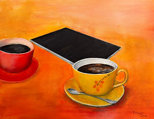 2 bright coofee cup and a tablet in warm colors