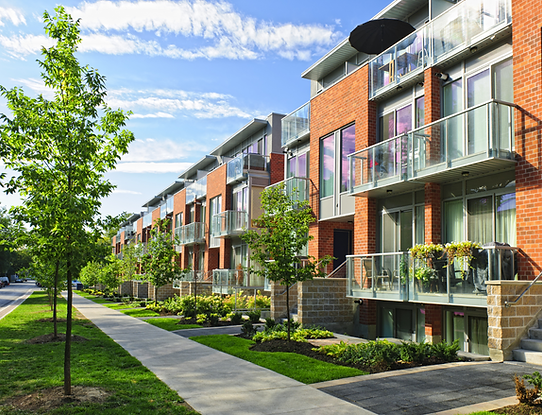 Three-story townhome buildings.