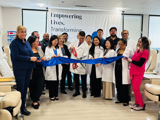 A group of doctors at ribbon cutting for Oncura Health