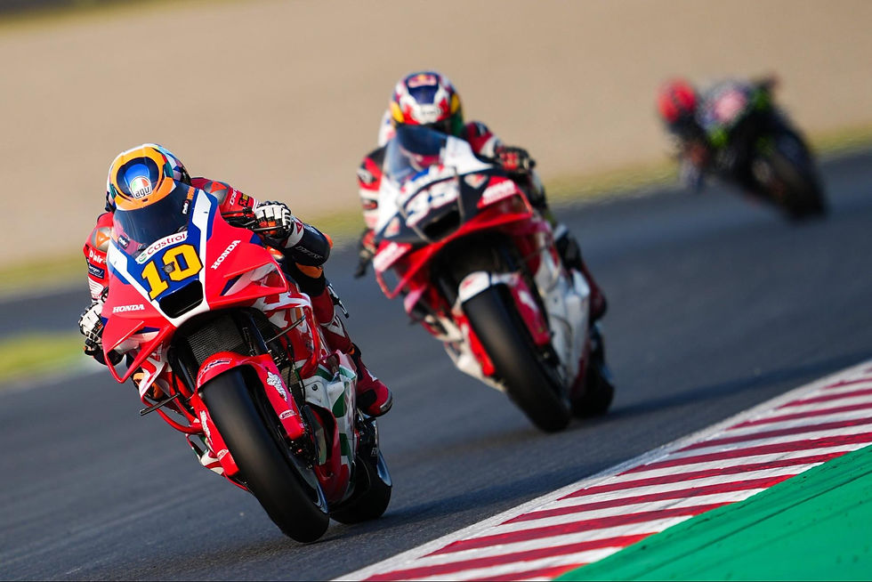 Luca Marini ahead of Somkiat Chantra in Motegi | Credit: HRC_Motogp