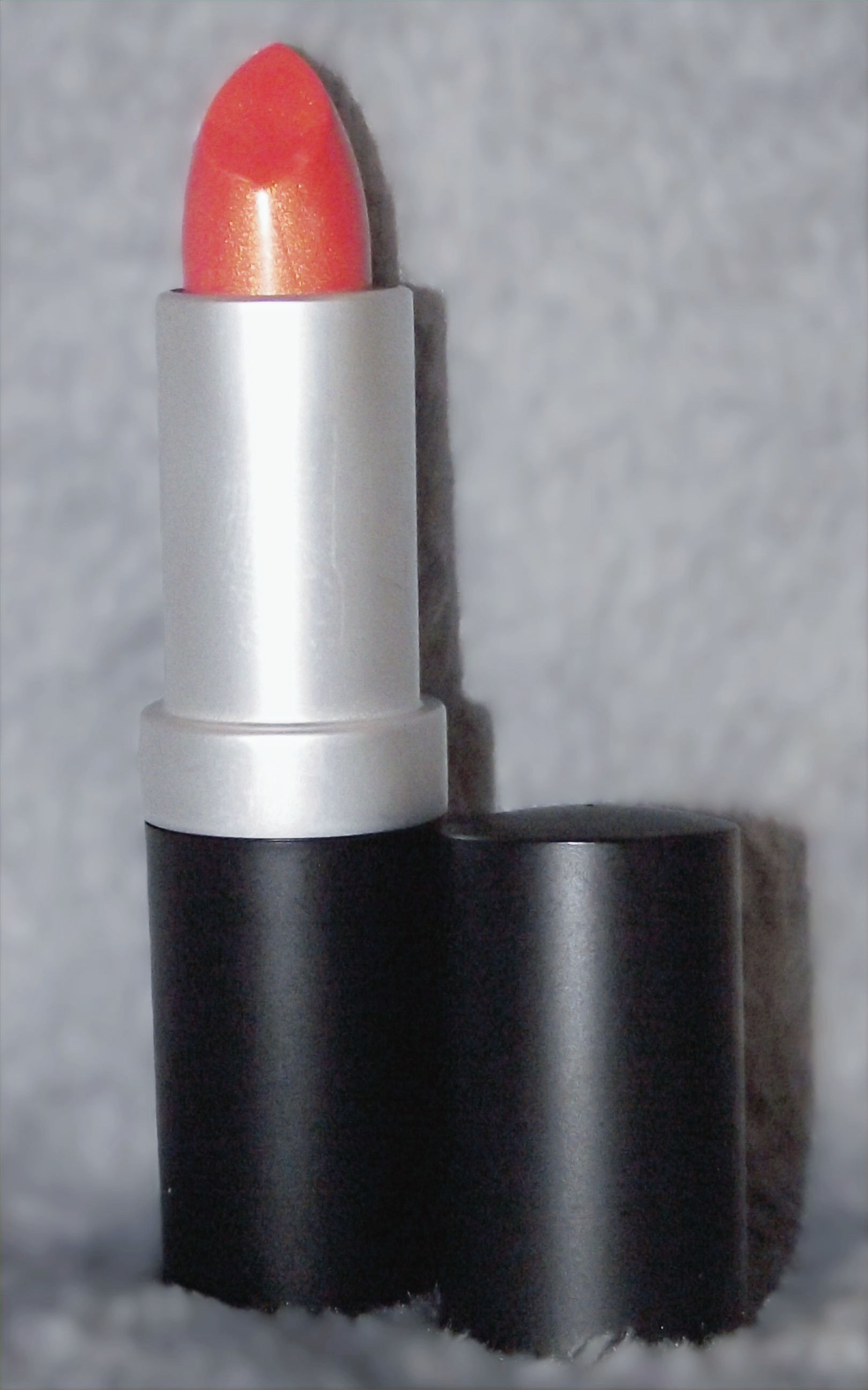 CK's Intense Coral Lipstick