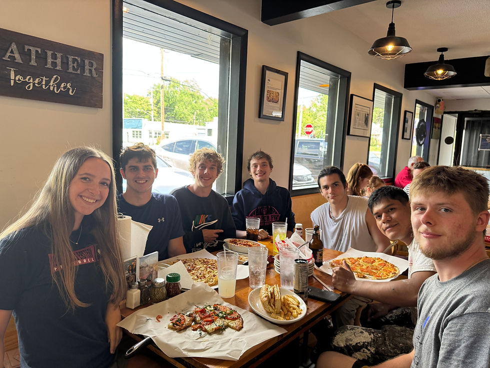 General Manager Brooke Fausey eating with Nolan Staniszewski's Crew