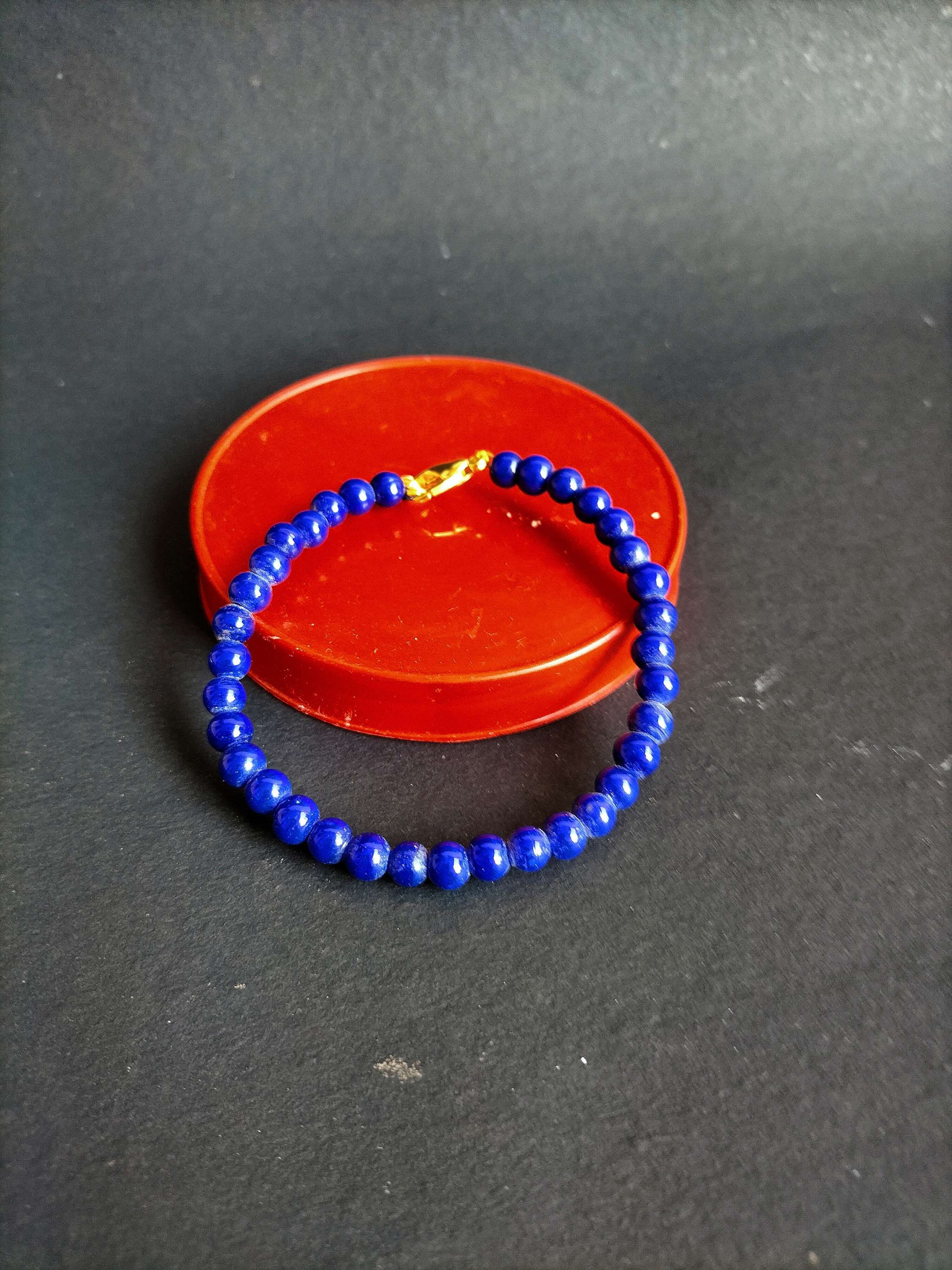 Handmade glass bead bracelet.