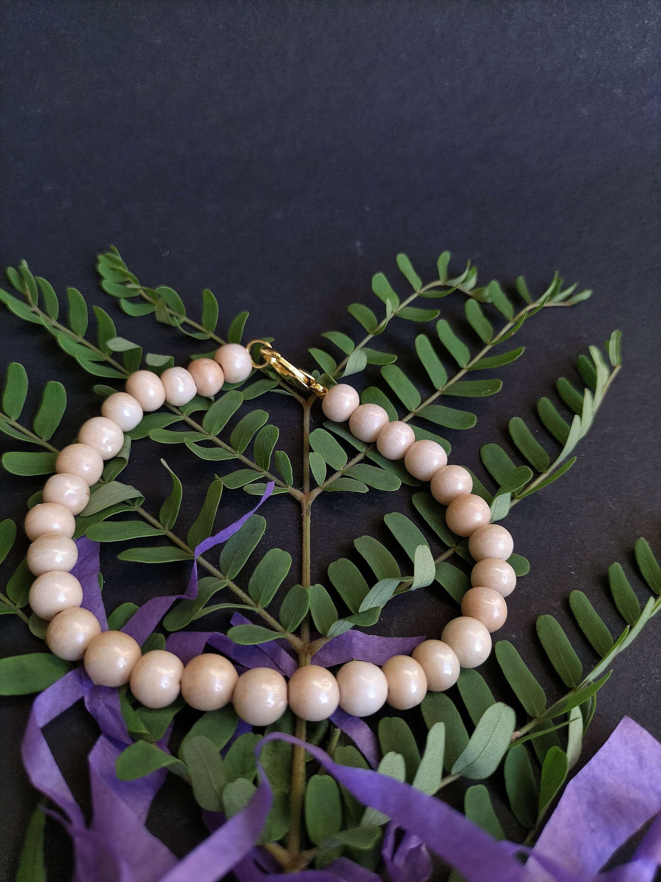 Handmade glass bead bracelet.