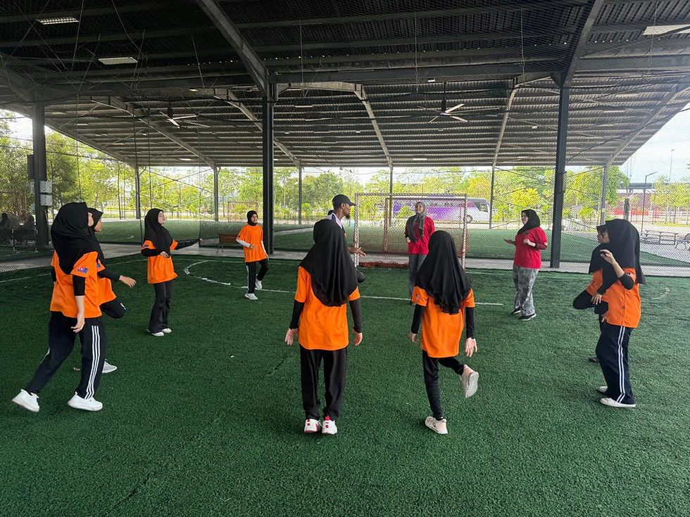 Ladies from the Surya Cahaya Bakti enjoying their training session during the soccer seed soccer camp