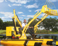 Tractor-style boat for aquatic plant collection
