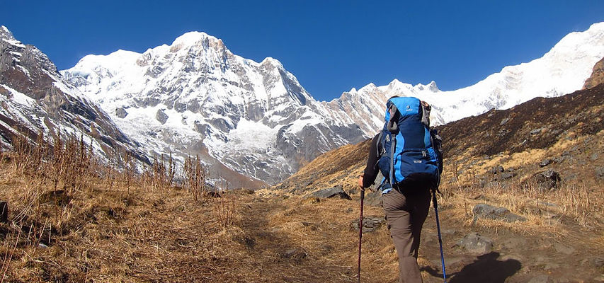MAN LOOKING MOUNTAIN