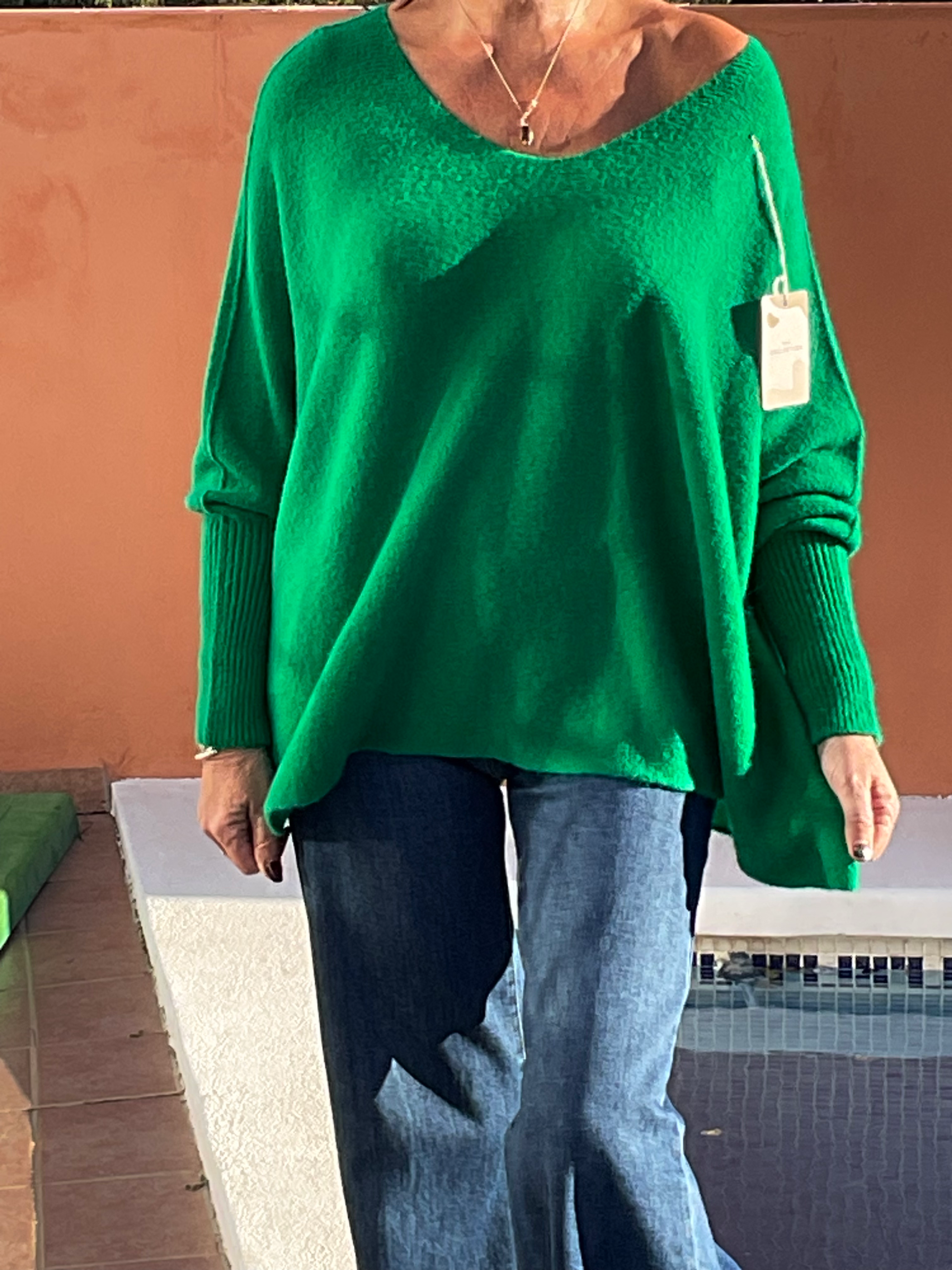 849  Green soft knit loose fit wide neck jumper size 12/18