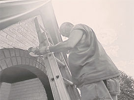 Man on ladder.