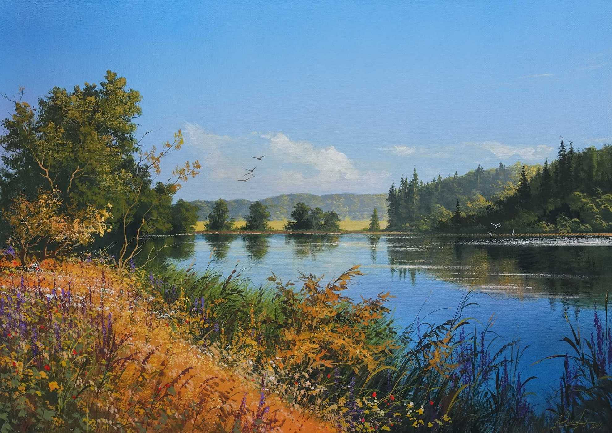 By the river