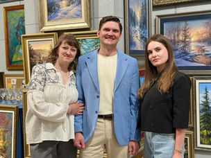 Viktor Yushkevich with his wife Helena and artist Julia Dunko at Ado-Art Gallery exhibition in Warsaw, 2026