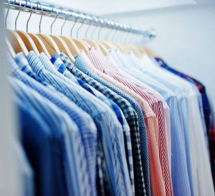 closeup-photo-fashionable-clothes-hangers-shop.jpg