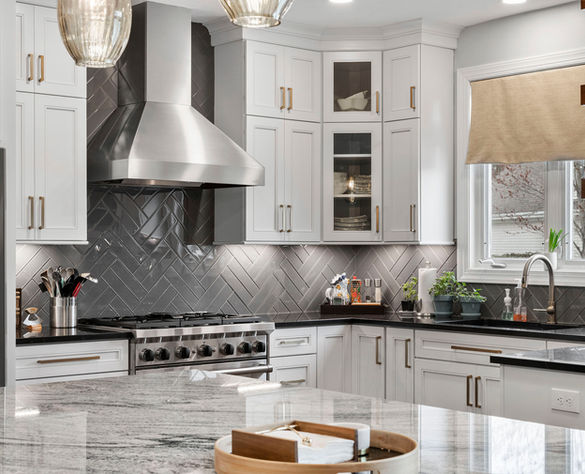 Kitchen stove and hood captured for marketing.
