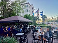 guests dining al fresco at San Miguels open air patio with the sunset in the background