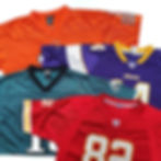 Unopened wholesale bale of NFL and NBA jerseys ready for resale.