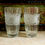 Thumbnail: A pair of moulded glass vases with sunflowers