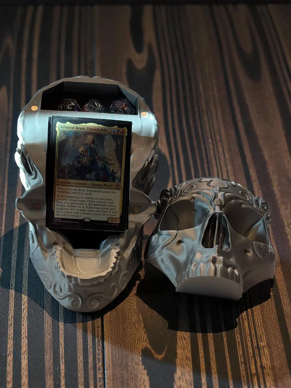 Thumbnail: Skull With a Secret deck box holding sleeved card deck