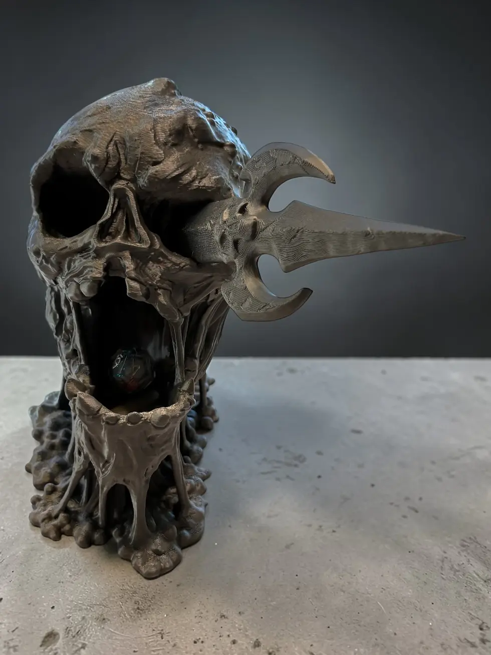 Thumbnail: 3D printed skull dice tower with dice rolling through hollow skull chamber