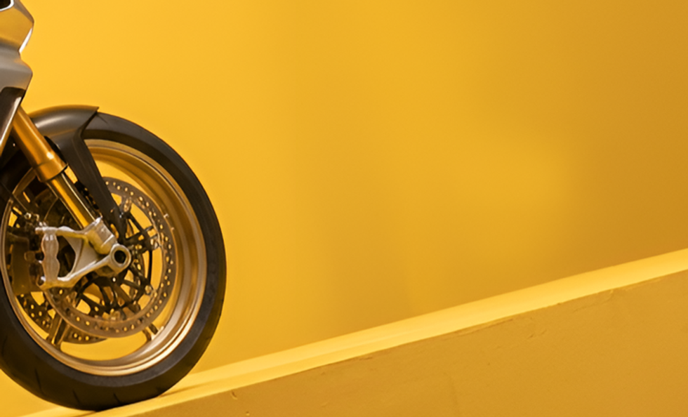 ReplacethemotorcycleinImage2withthemotorcyclefromImage1._Removetheboy._Adaptlightingshadow