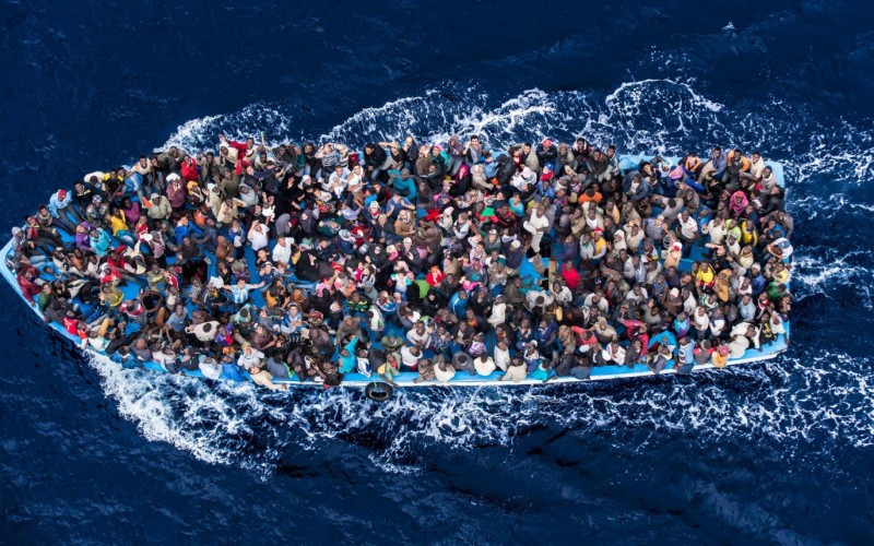 African migrants packed on a boat to Europe (Photo Credit: Global Risk Insights)