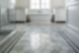 Elegant bathroom with hexagon marble floor tiles