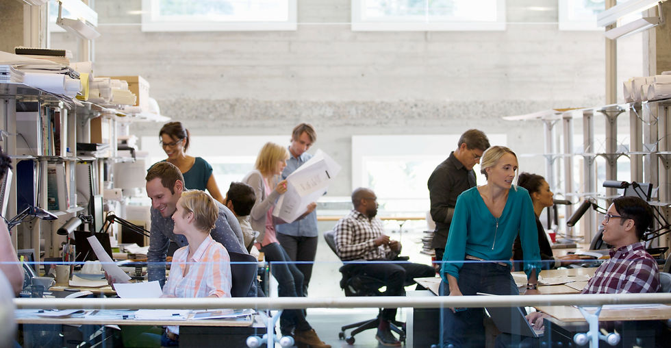 At a lively EMI office in Malta, employees work diligently together