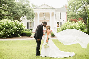 West Tennessee Bride and Groom portrait outside of the Venue at Twin Oaks. Florals and Planning by Dream Designs and Company. 