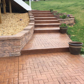 Stamped Concrete Walls by Greystone Masonry